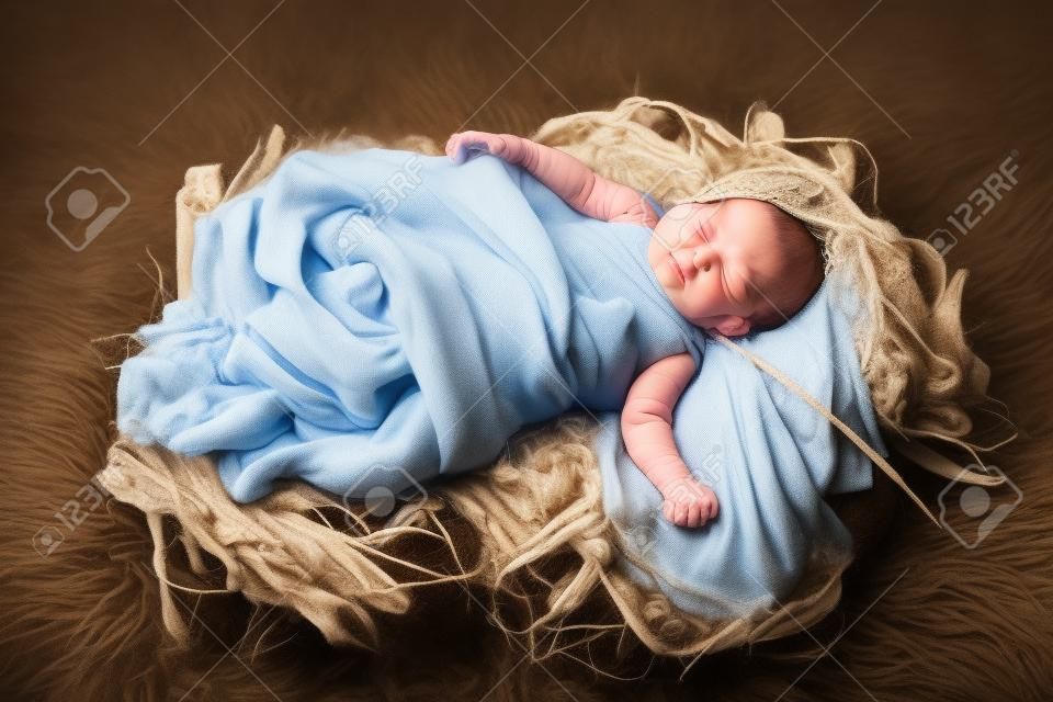 Jezus Baby swaddled i leÅ¼Ä…cego w manger