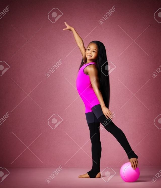 Cropped Photo Of Girl Gymnast In Black Body And Leggings Is Training With A  Pink Gymnastic Ball. Children's Professional Sport. Rhythmic Gymnastics.  Stock Photo, Picture and Royalty Free Image. Image 142623297.