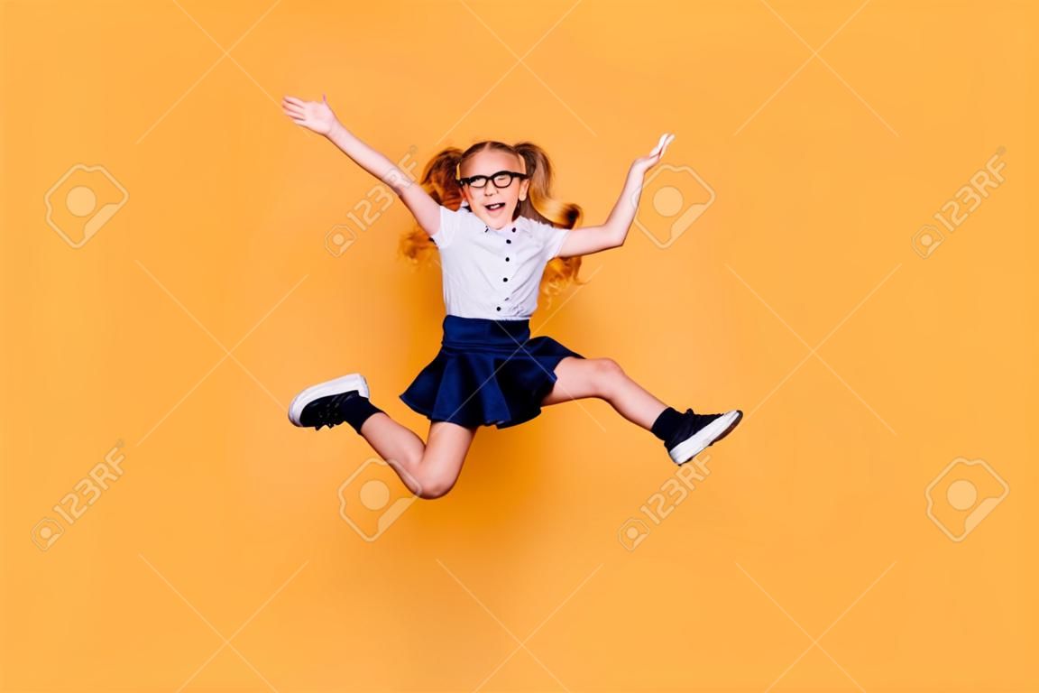 Rejoice delight enthusiasm positive laugh people person concept. Full length size studio photo of cheerful excited sweet cute clever optimistic jumping schoolchild gesturing hands isolated background