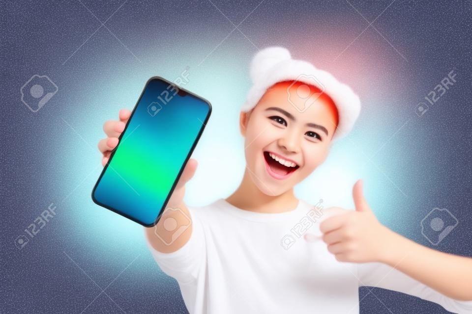 Close up photo of funky energetic student showing her mobile phone agreement appreciation wearing light cotton outfit on colorful background