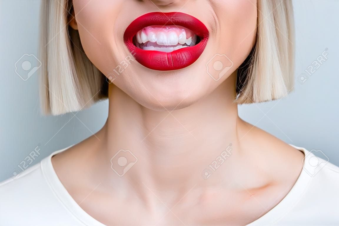 Close up cropped photo of adorable cute cheerful girl with healthy teeth dental clinic treatment isolated on grey color background
