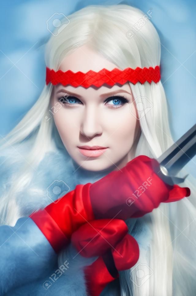 Portrait of the blonde girl in the Scandinavian suit with sword
