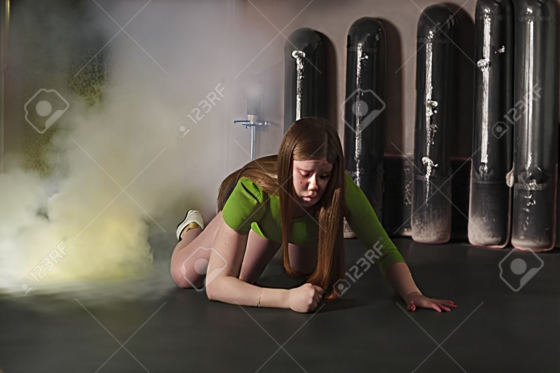 Thriller film. Girl suffocating from poisonous smoke