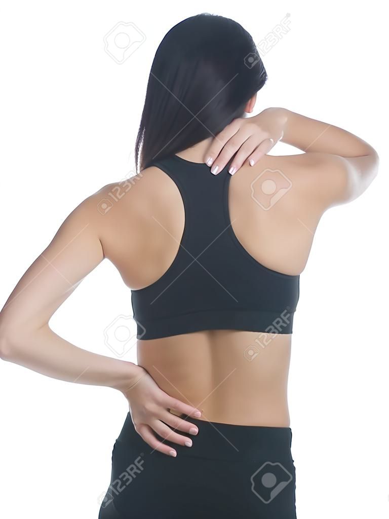 Boyun, omuz ve sırt ağrısı çeken bir fitness kıyafeti giyen bir kadının izole stüdyo çekimi.
