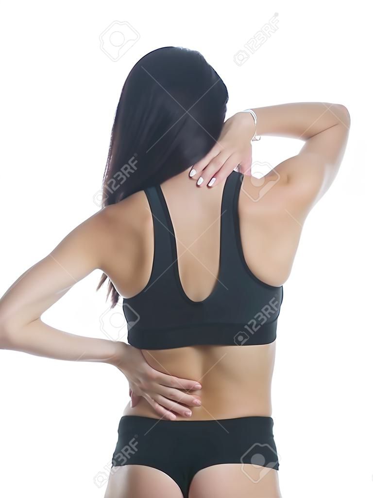 Boyun, omuz ve sırt ağrısı çeken bir fitness kıyafeti giyen bir kadının izole stüdyo çekimi.