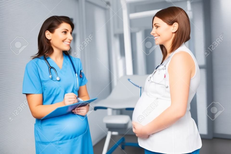 Nurse weighing pregnant woman in ambulances