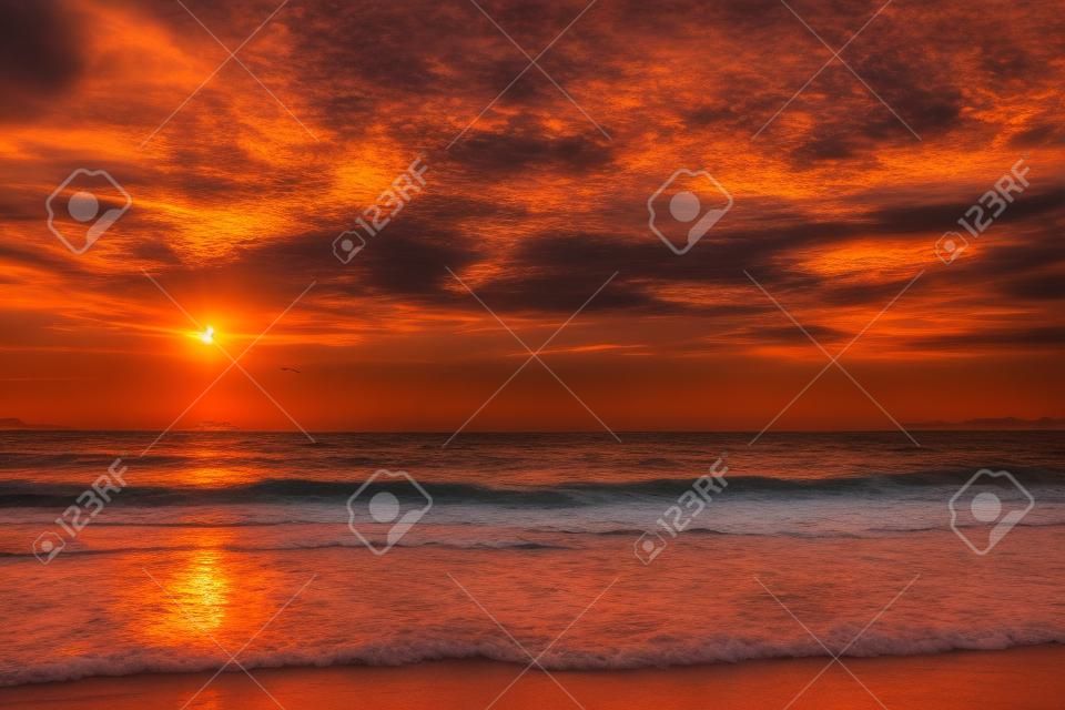 Amazing sunset on the sea beach.