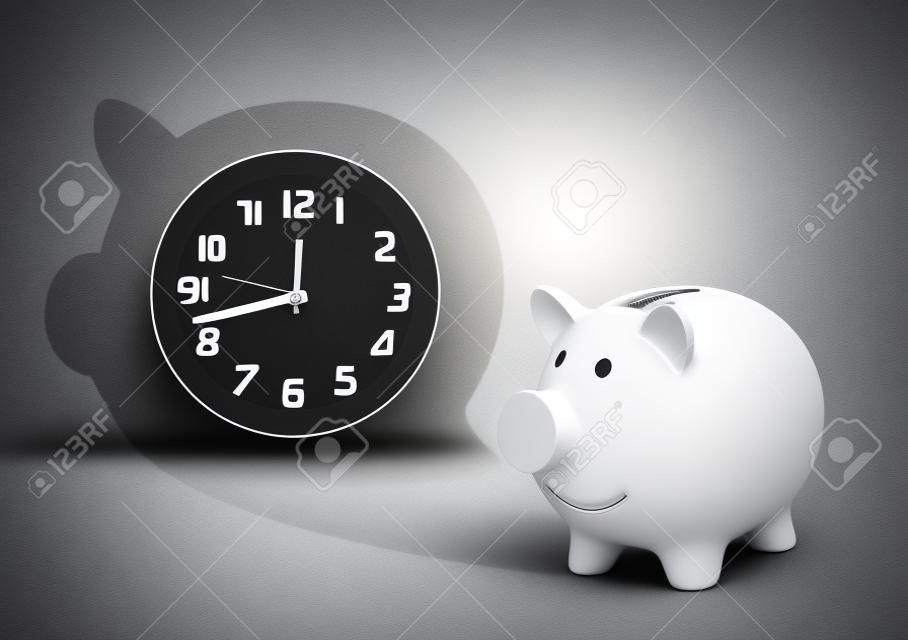 Zeit ist Geld Konzept, Sparschwein mit Uhr Schatten auf grau