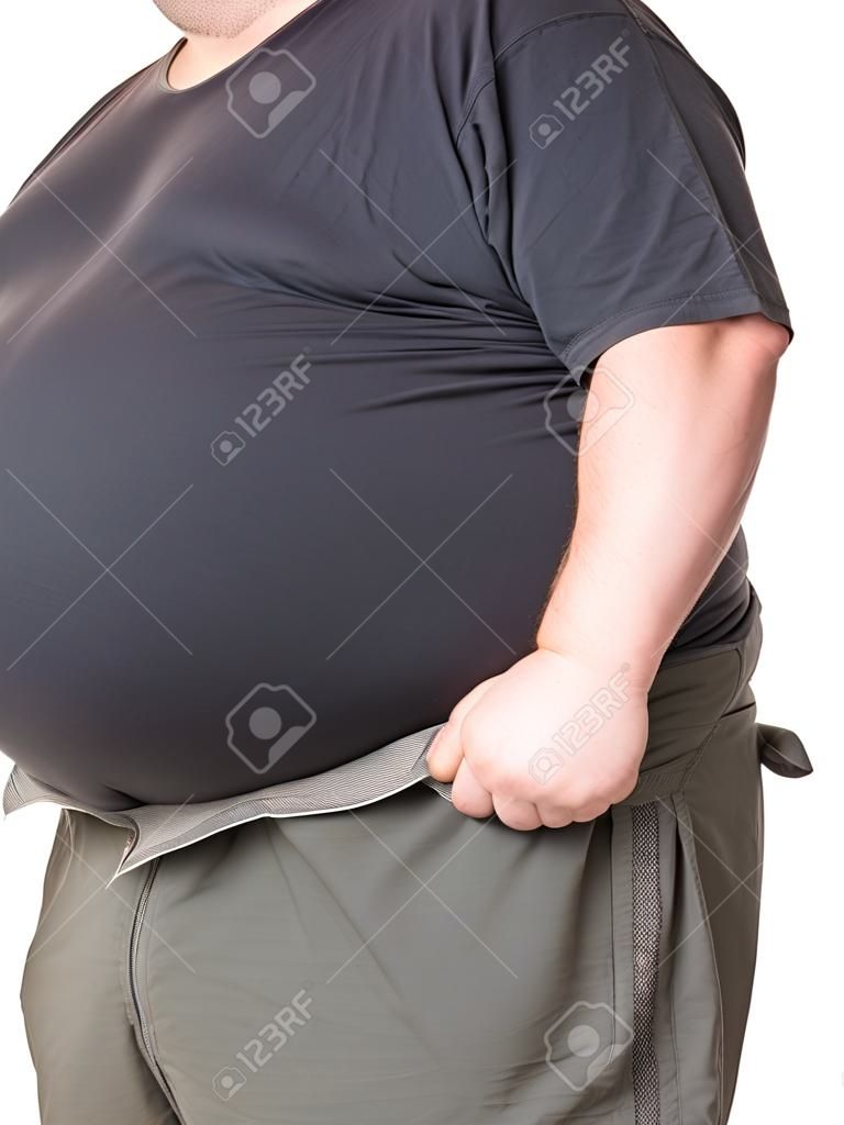 Fat man with a big belly, close-up part of the body