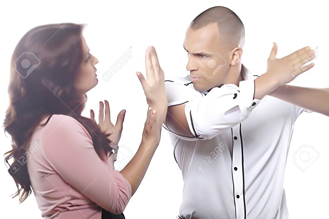 Angry Man Slapping Woman On White Background