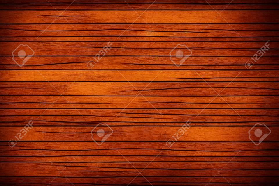 木製のテーブルのテクスチャ。背景として茶色の板