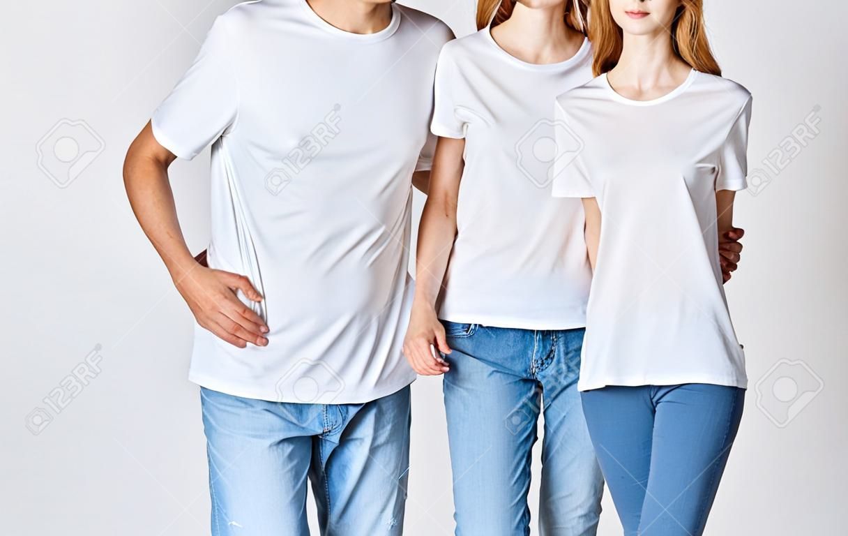 man and woman in white t-shirts and jeans fashionable style clothes