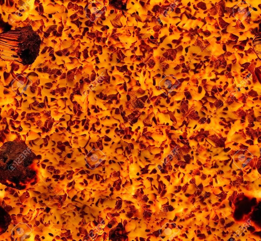 hot fire coal lava texture background. grained texture