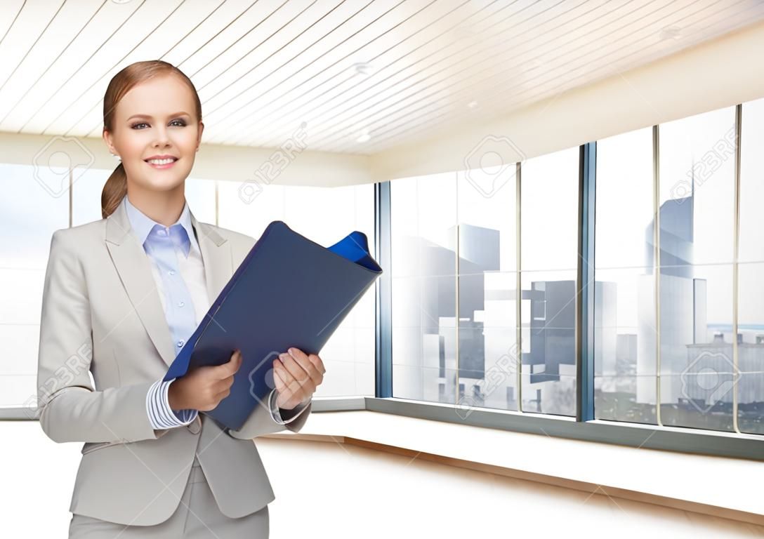 business, real estate, banking and people concept - smiling businesswoman with folder and keys over office room or new apartment background