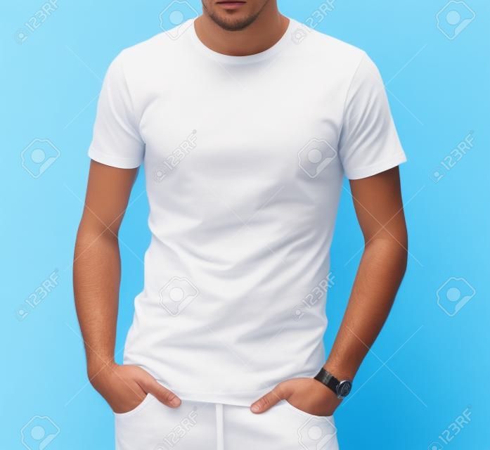 clothing design, advertisement, fashion and people concept - close up of ma in blank white t-shirt over blue background