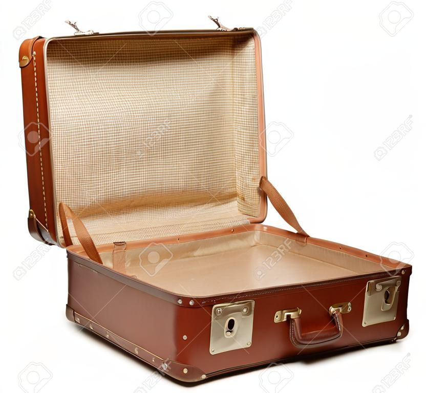 Vide valise ouverte vintage sur fond blanc