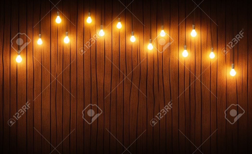 Light bulbs on dark wooden background