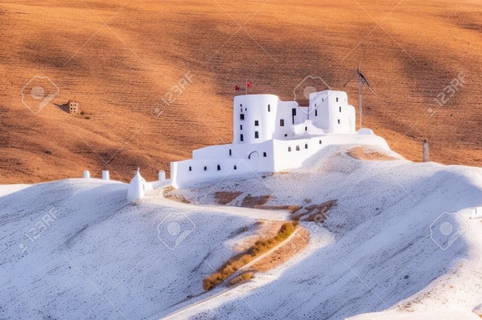 Castle at Consuegra surrounded with white windmills, Spain