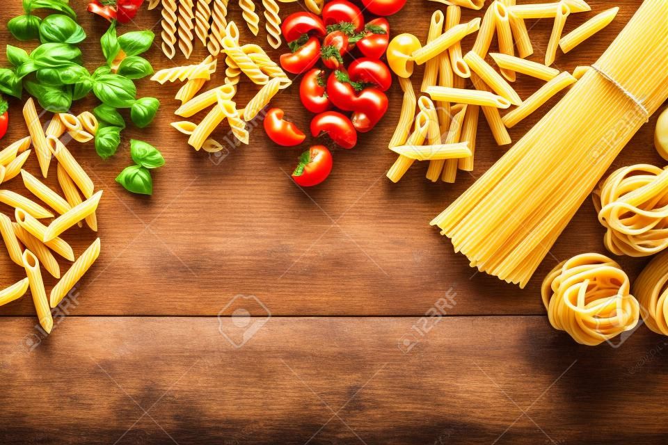 Pasta collection on rustic wooden background
