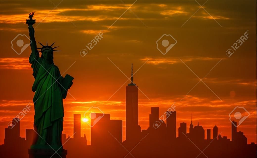 Silhouette of the Statue of Liberty over the scene of New york cityscape on a sunset.