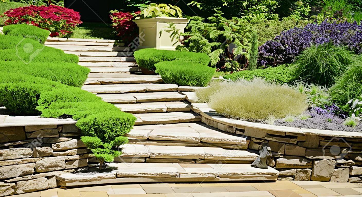 Natural stone landscaping in home garden with stairs