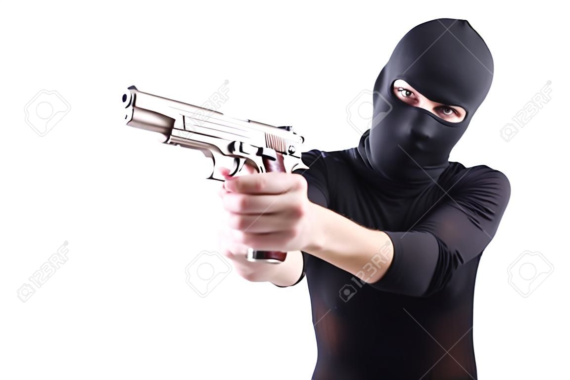 Burglar with handgun isolated on white