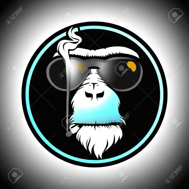 vector design monkey's head wearing sunglasses who were smoking