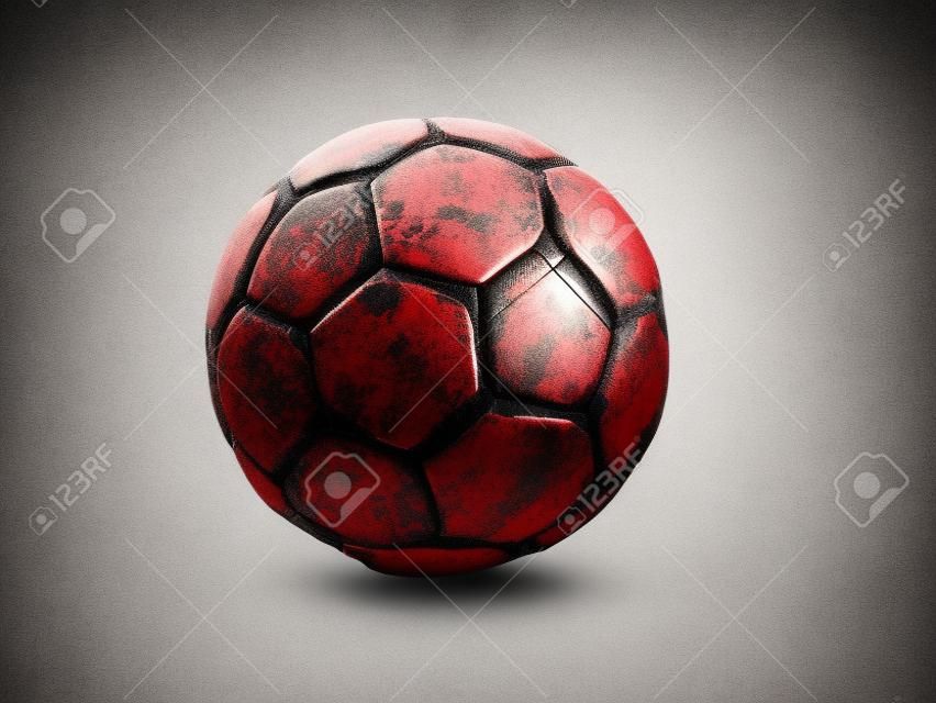Old, torn, dirty and damaged soccer or football ball isolated on white background