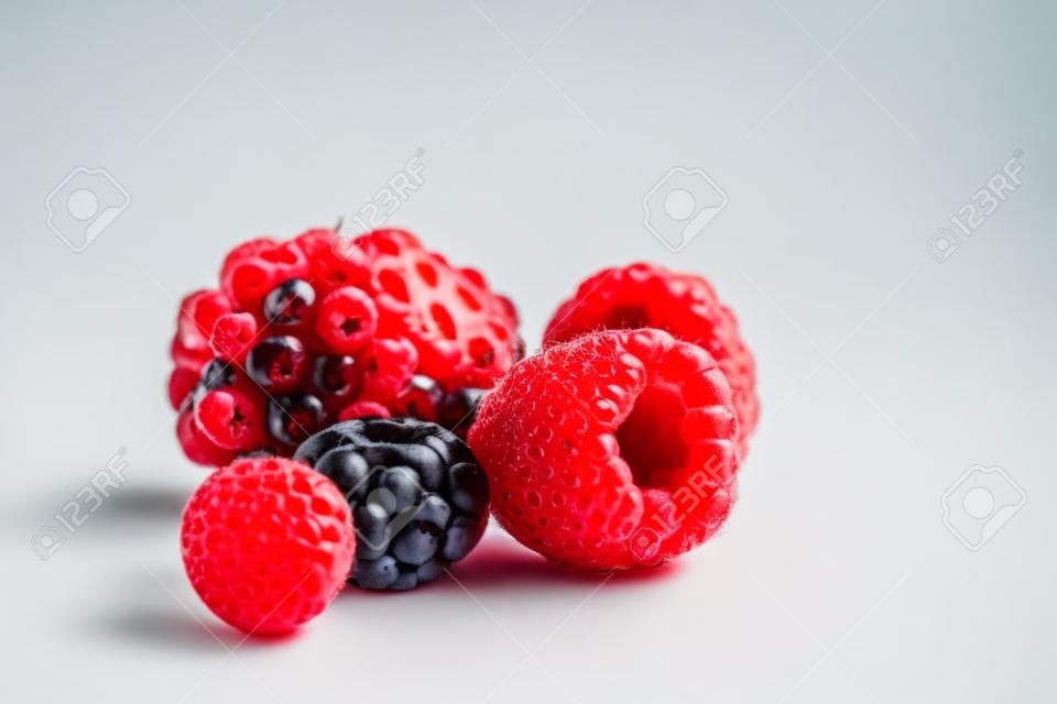 close up view of nice fresh berries on white  background