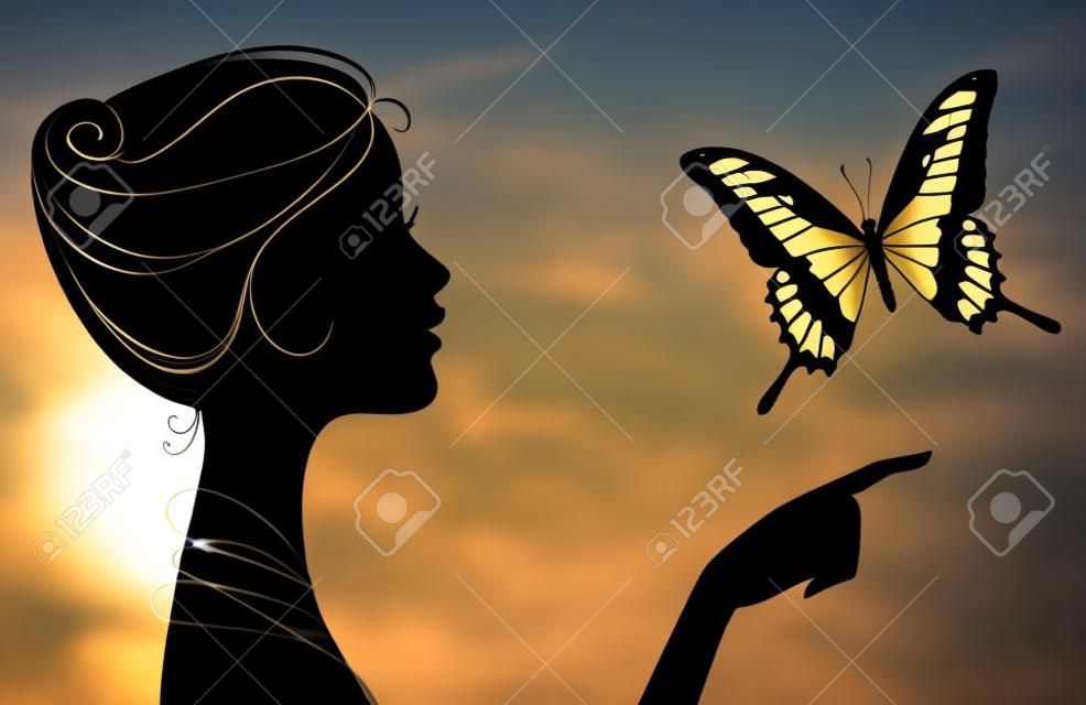 silueta de la hermosa muchacha con mariposas
