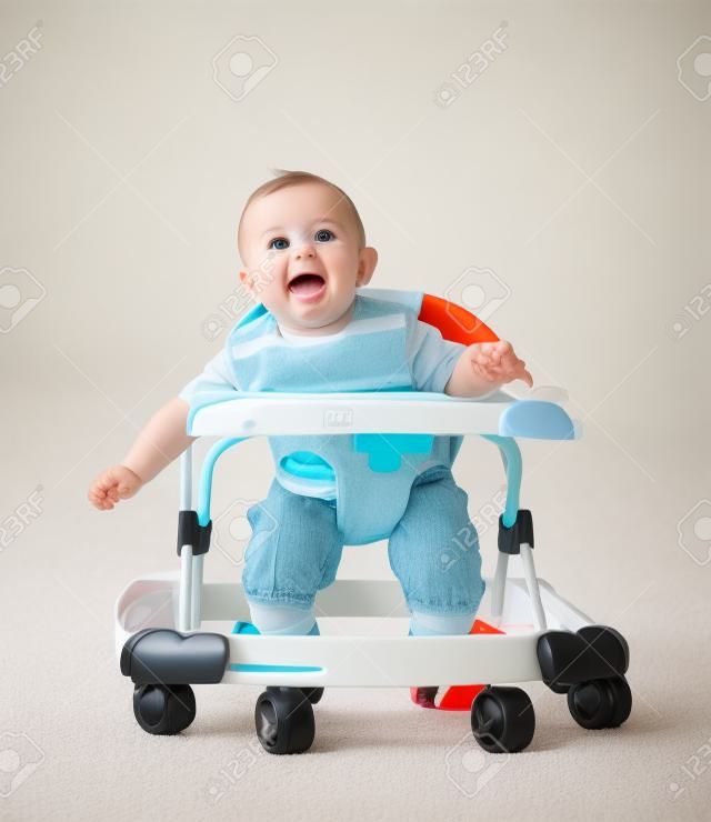 little  baby in the baby walker.