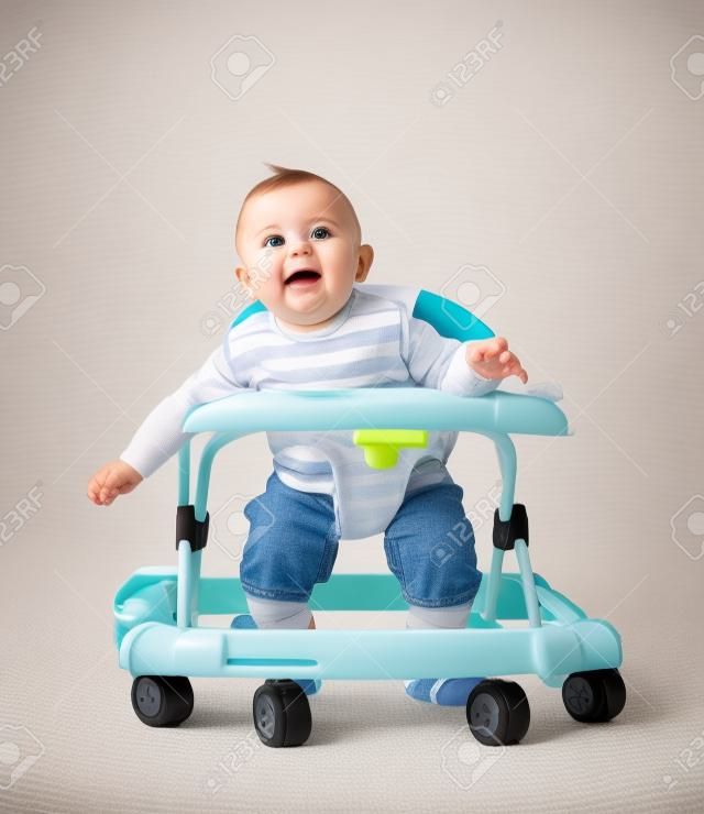 little  baby in the baby walker.