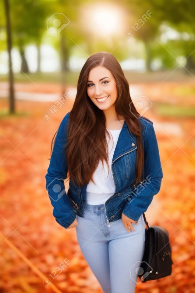Attractive young woman enjoying her time outside in park