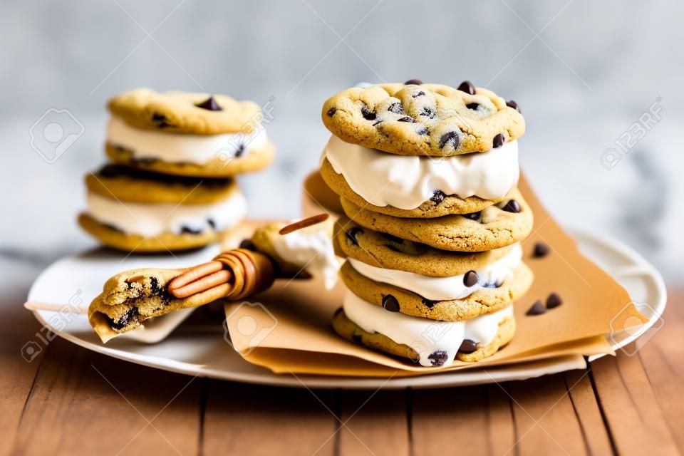 Ice cream sandwiches with nuts and caramel and chocolate chip cookies