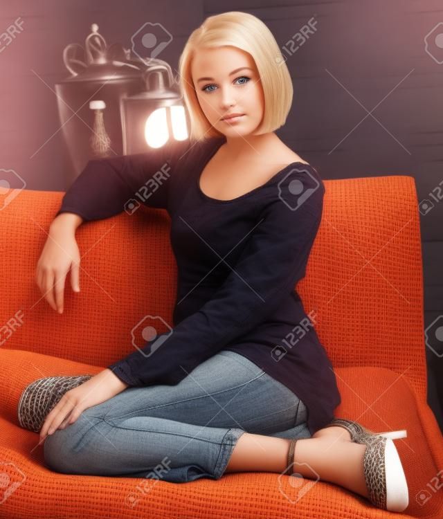 Blond Teen GirlPosing on the Couch