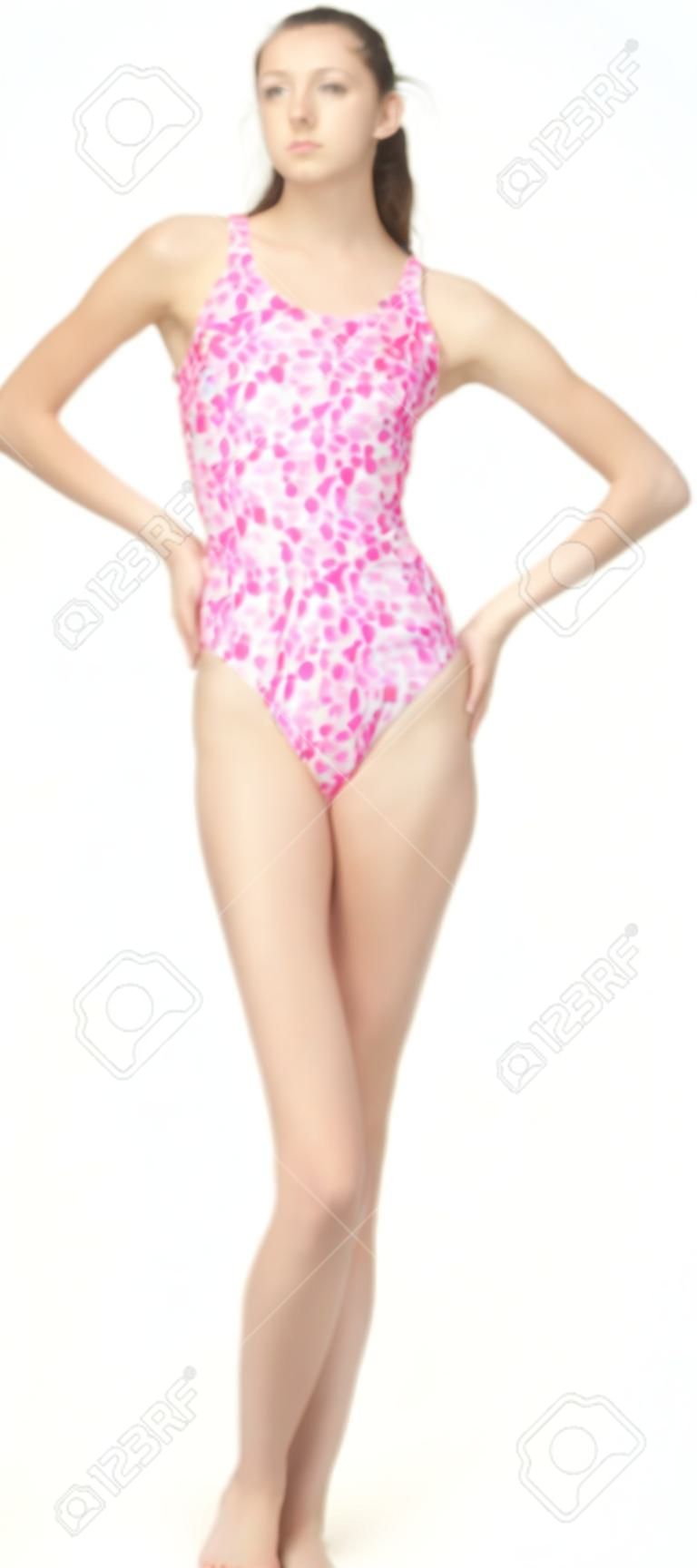 Teen girl modeling a one piece swim suit