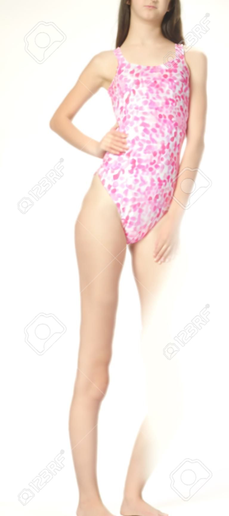 Teen girl modeling a one piece swim suit
