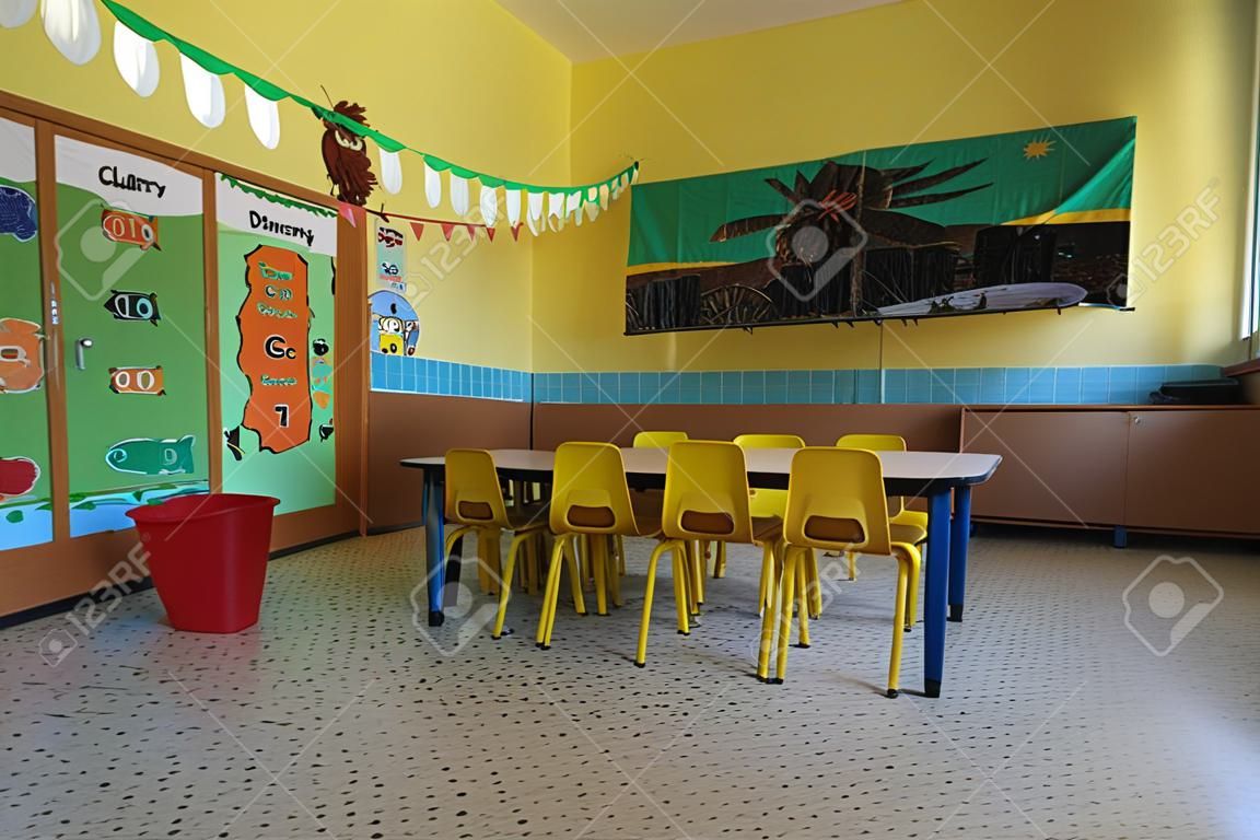 kindergarten class with yellow chairs in the morning