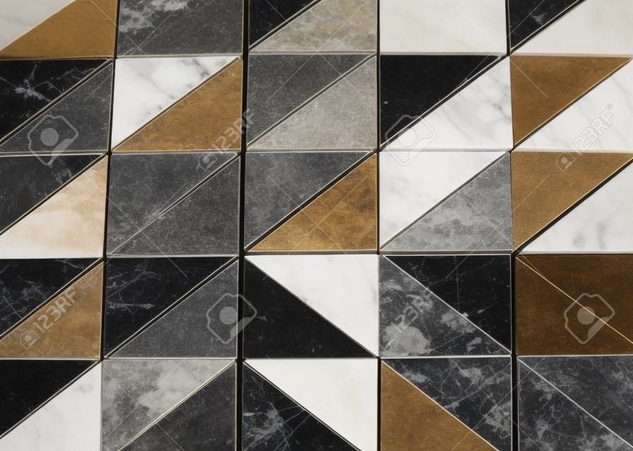 background of triangular marble stones each made with a different type of marble from all over the world