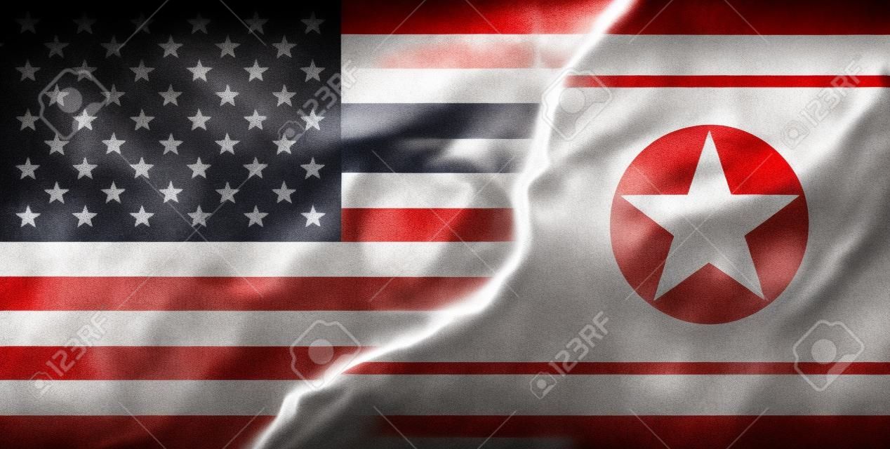 North Korea and USA, America flags background. cracked wall. Military conflict and war concept