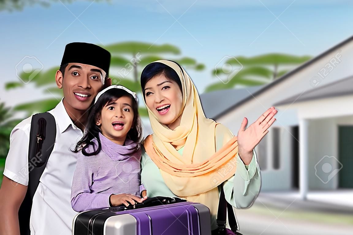 muslim family with suitcase and passport travelling