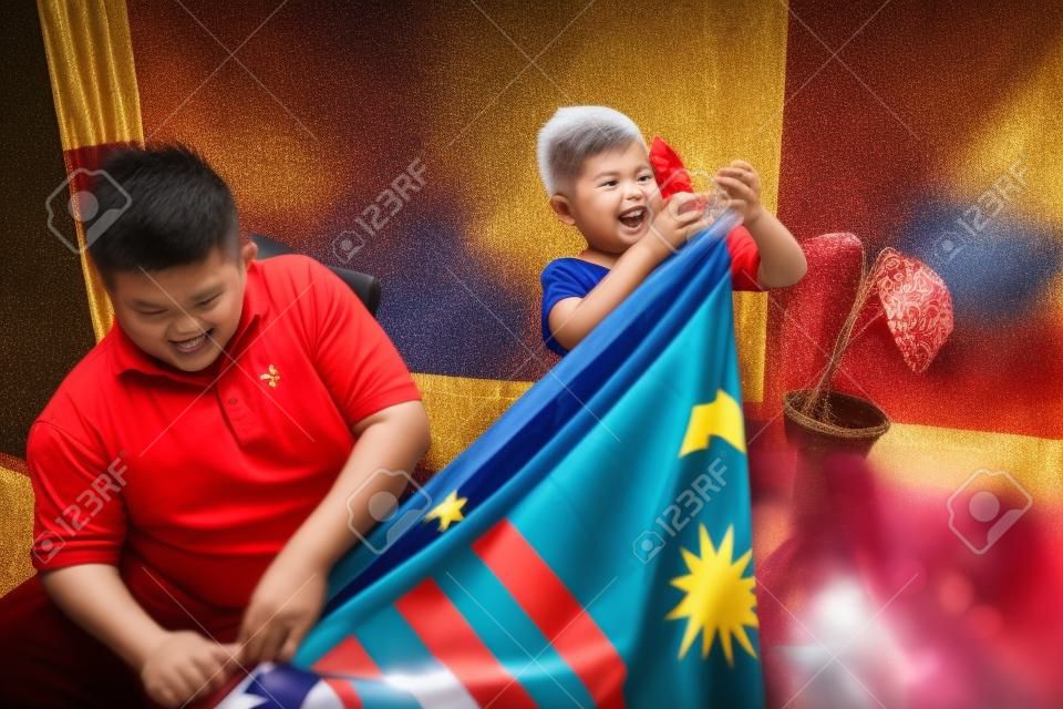 Family celebrating malaysia national independence day
