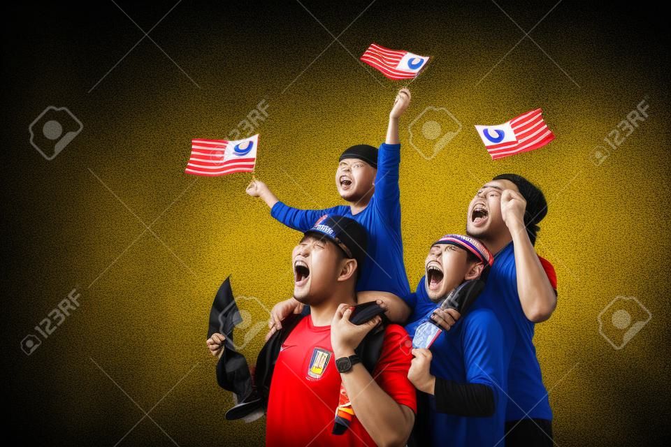 Excited malaysian sport fans supporter