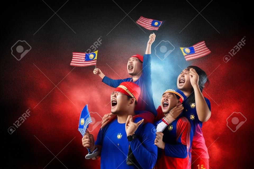 Excited malaysian sport fans supporter