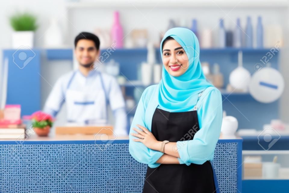 Successful muslim asian small business owner