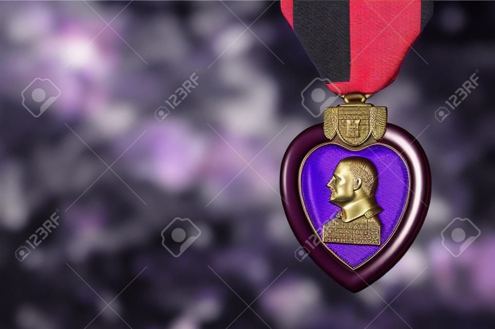Purple Heart Miltary Merit Medal Against Darkened American Flag