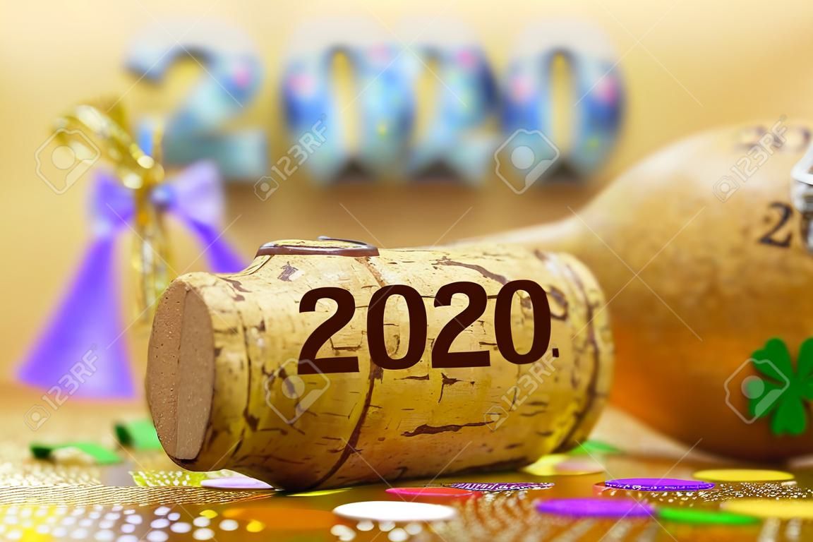 Happy new year 2020 with cork of champagne