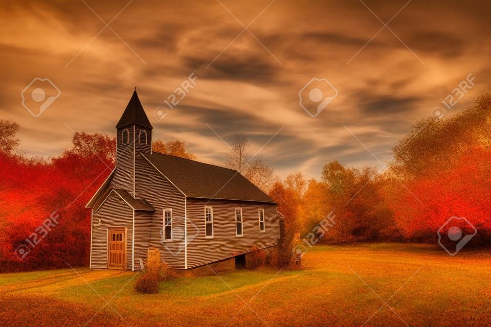 Rustic Christian wooden church in a rural small town in Maryland during Autumn with Fall Colors
