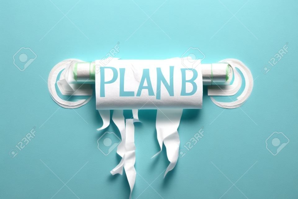 Leere Toilettenpapierrolle mit dem Satz Plan B