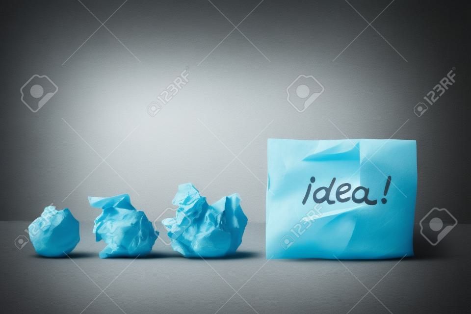 Evolving idea concept crumpled paper ball brainstorming for a good idea
